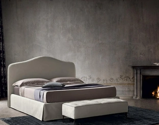 Letto in tessuto con testiera sagomata Damian di Felis