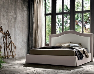 Letto imbottito con testiera sagomata Oscar di Felis