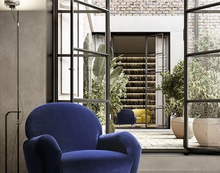 Poltrona in tessuto con piedini in metallo Clair di Felis