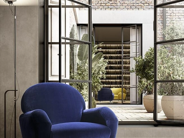 Poltrona in tessuto con piedini in metallo Clair di Felis