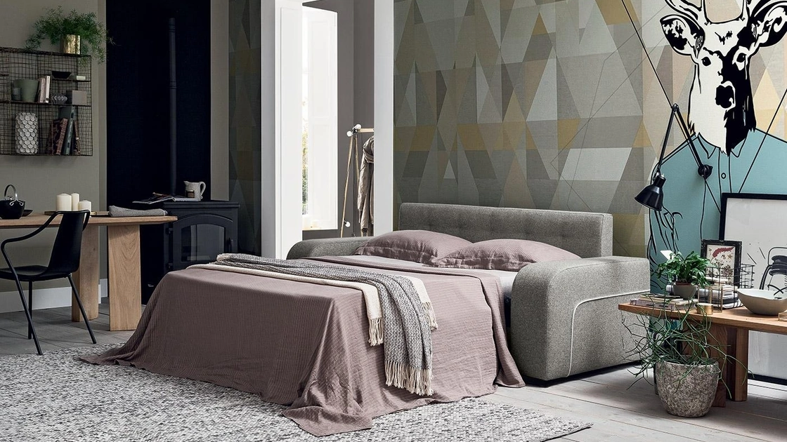 Divano Letto in tessuto con testiera trapuntata Didier di Felis