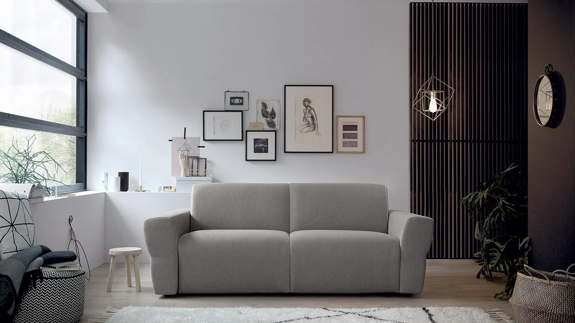 Divano Letto in tessuto con ampi braccioli Yves di Felis