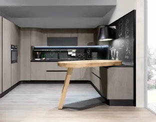 Cucina Design angolare con penisola Penelope in natural Ash con piano snack in ulivo massello di Aran