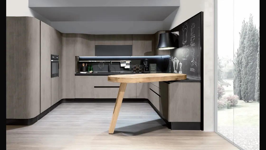 Cucina Design angolare con penisola Penelope in natural Ash con piano snack in ulivo massello di Aran