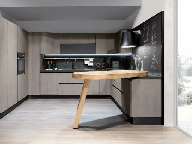 Cucina Design angolare con penisola Penelope in natural Ash con piano snack in ulivo massello di Aran